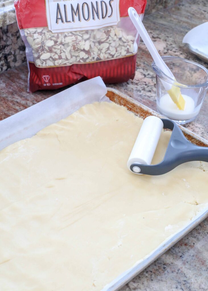 Almond bars ready for toppings before baking