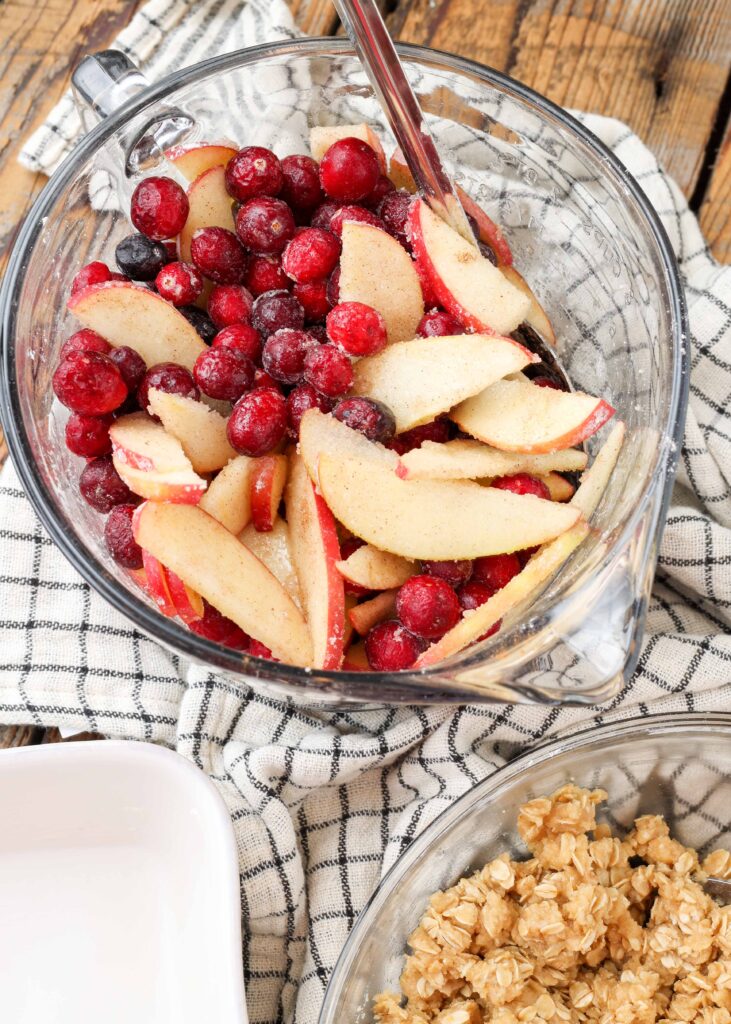 cranberries and apples in bowl