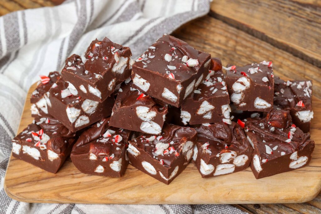 chocolate fudge with candy canes and marshmallows