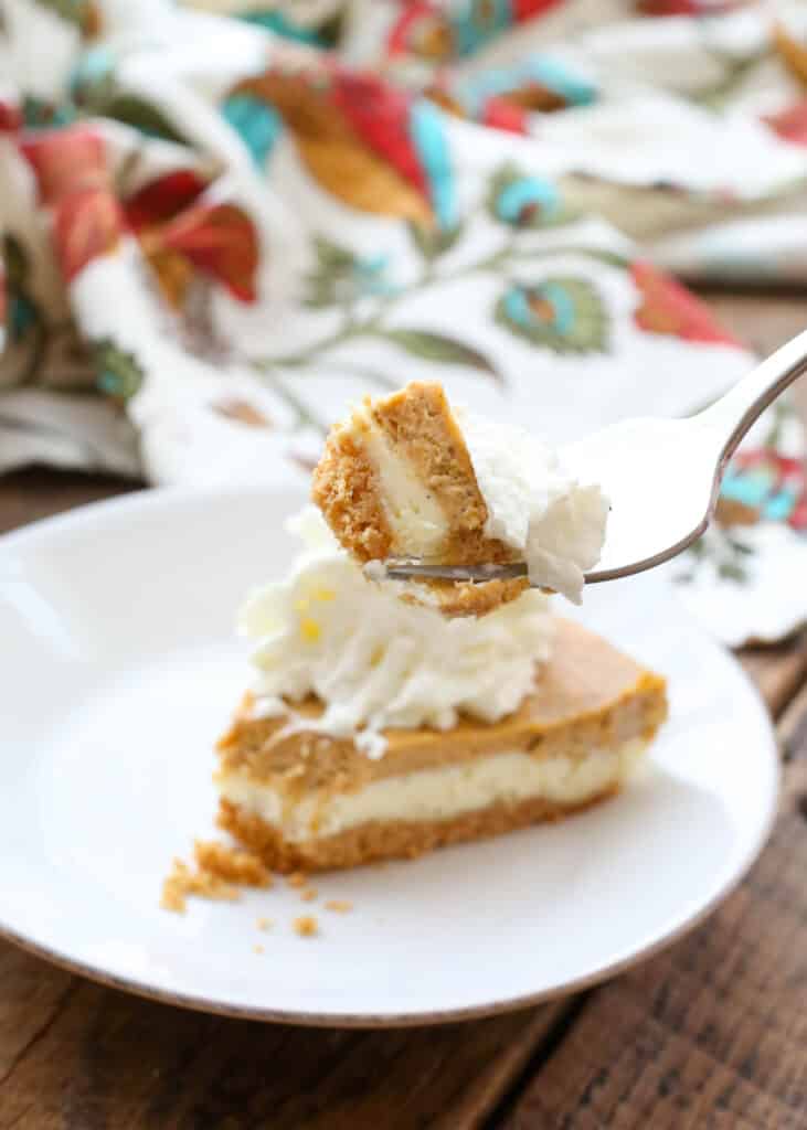 Layered Pumpkin Cheesecake Pie is a holiday favorite! get the recipe at barefeetinthekitchen.com