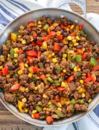 Taco Beef loaded with peppers, black beans, and corn adds up to a taco night we all love.